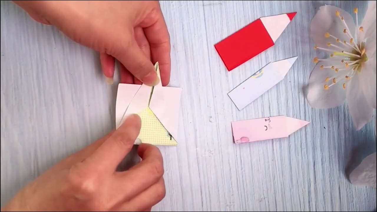 origami making paper art pencil and triangle