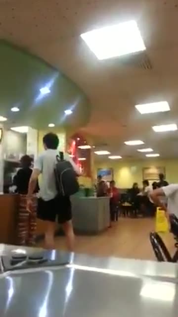 A Chinese man launches racist slur on a woman and husband steps up...!!