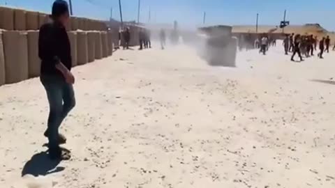 American mercenaries throw stun grenades and fire live rounds at Palestinian civilians seeking to fetch aid from the newly opened aid distribution point in central Gaza, leaving dozens injured.
