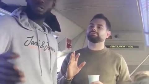This fake asylum seeker is going crazy on a train