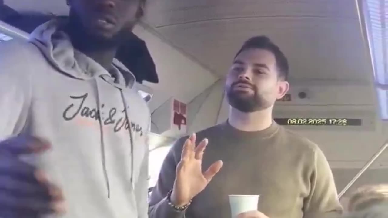 This fake asylum seeker is going crazy on a train