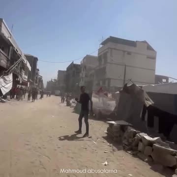 An Israeli air strike targets a group of civilians in the vicinity of Al Shifa hospital in Gaza city