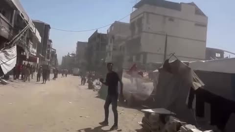 An Israeli air strike targets a group of civilians in the vicinity of Al Shifa hospital in Gaza city