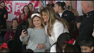 First Lady Melania Trump Happily Takes Selfies With Children At Toys For Tots Event