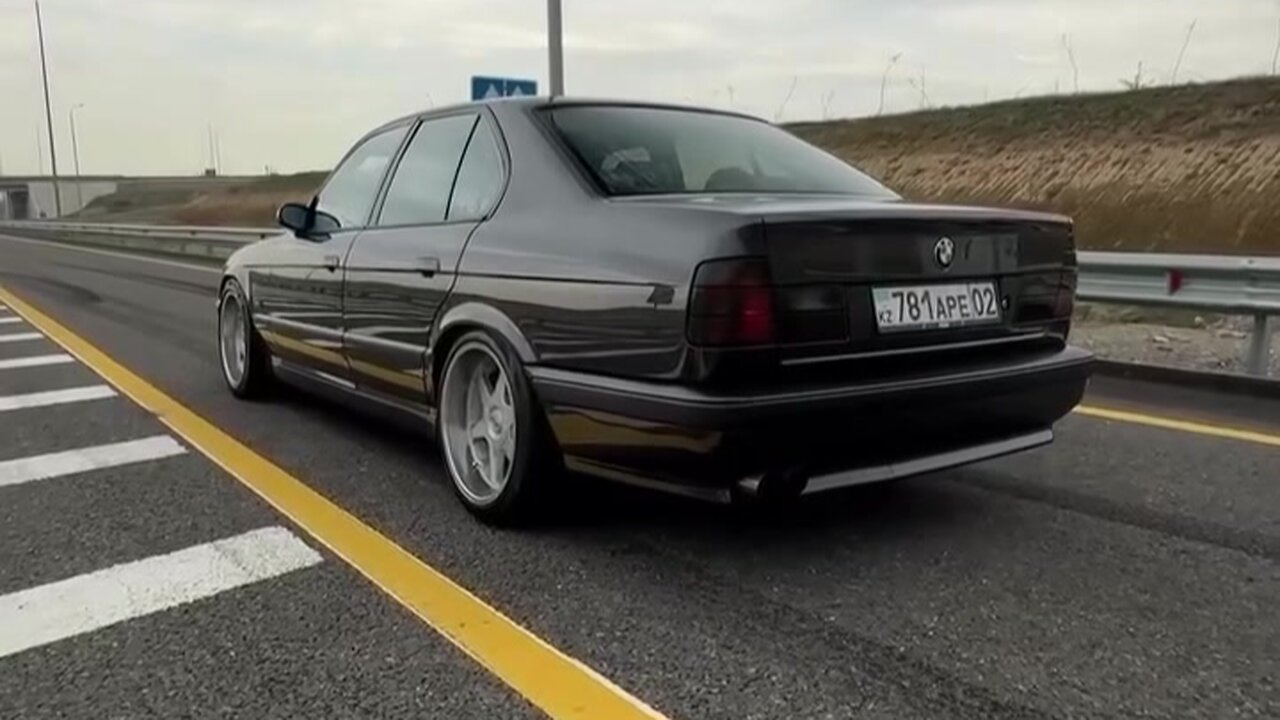 BMW E34 power slide