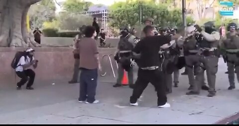 Violent rioter throws a bottle at Sheriffs and pays the price