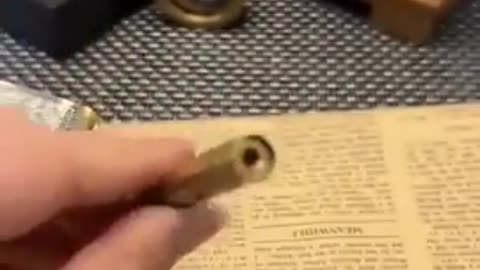 An Antique sailor’s lighter, shaped like a cigarette