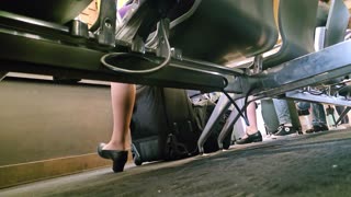Operation airhose- candid dangle and slide under chair.