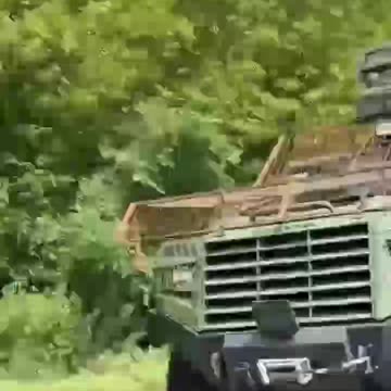 Ukrainians Evacuating Inside APC On 3 Wheels