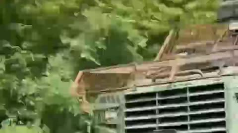 Ukrainians Evacuating Inside APC On 3 Wheels