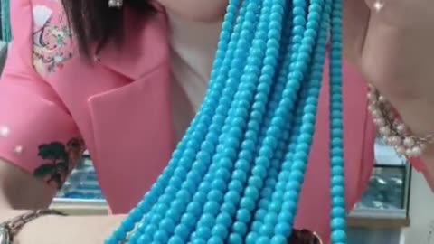 250414-12 Selected natural raw turquoise is used to make round bead