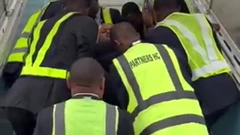 It took 8 grown men to help a 500 pound women get into airplane