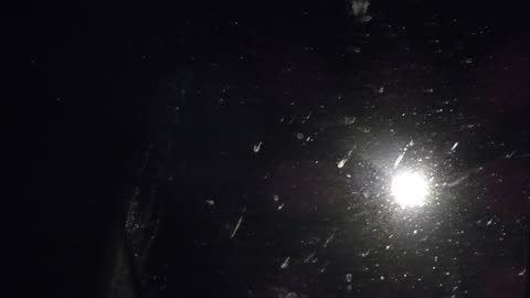 Light looks like it changes color as it passes vehicle window filer