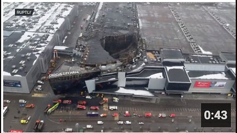 "🇷🇺 "Crocus" Aerial View: Collapsed Roof at Fire Site Clearly Visible"