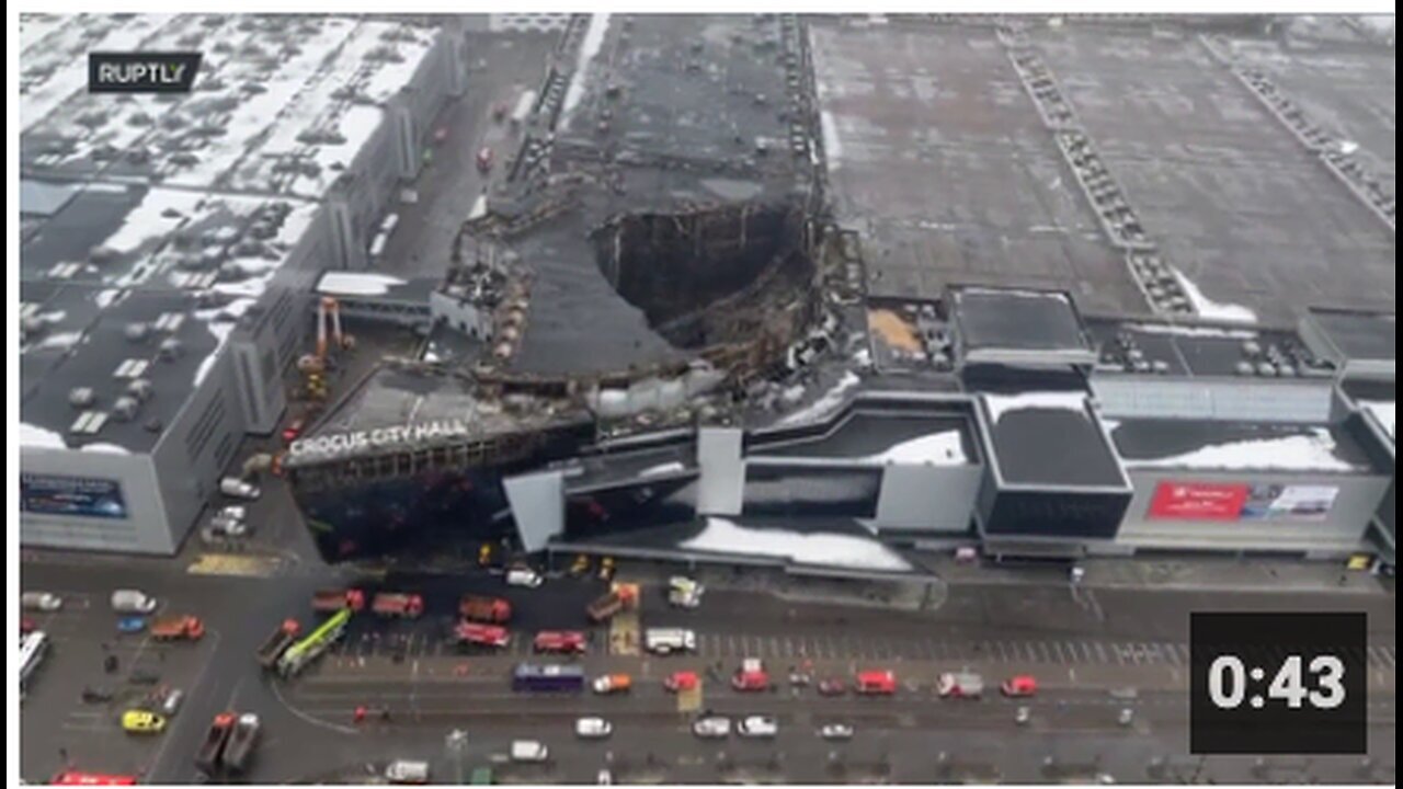 "🇷🇺 "Crocus" Aerial View: Collapsed Roof at Fire Site Clearly Visible"