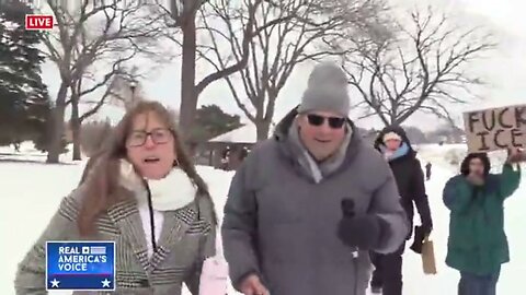 Protester Heckling Journalist Doesn't Seem To Realize She Comes Across As Retarded