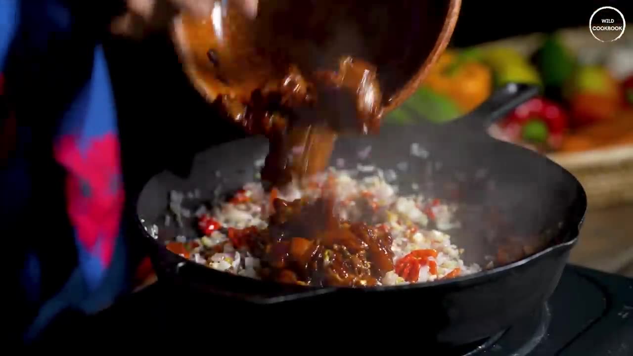 Making Nasi Goreng, The Indonesian Fried Rice In A Calm Evening
