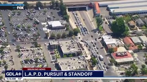 Emerging: End of pursuit in Los Angeles, California area leads to standoff outside Costco.