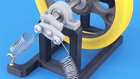 Fly Wheel Regenerating Energy From Spring Mechanism