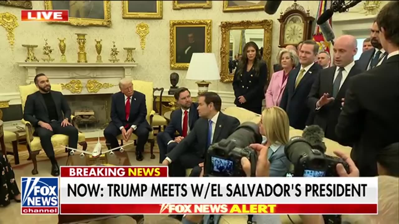 Trump goes after 'fake news,' spars with 'low-rated' CNN anchor
