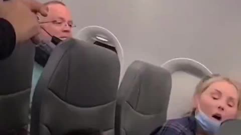 Mom and her sleeping kids get kicked off a plane for asking about a delay
