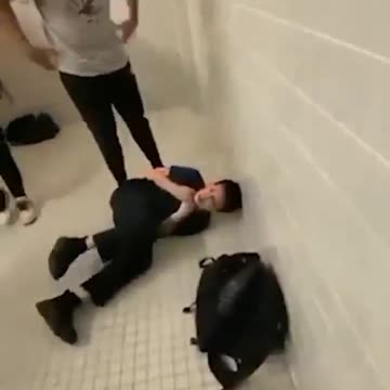 Savage Nigger Gorilla Kicks Little White Boy In School Bathroom