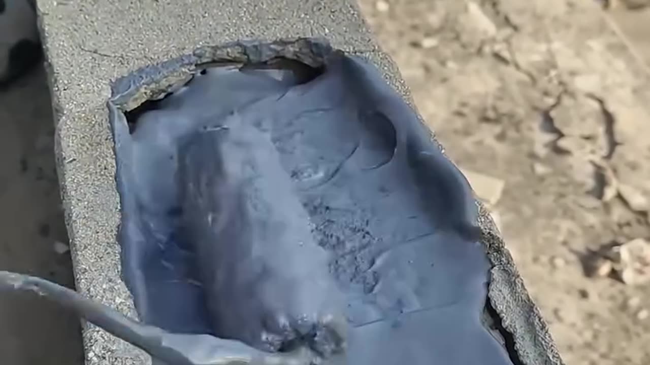 Repairing a Crack in a Wall with Sealant