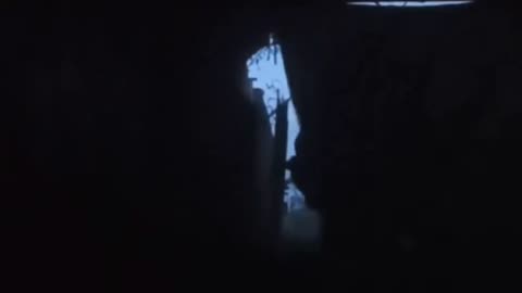 Ukrainian Soldier Firing On Russian Infantry from Outside Dugout