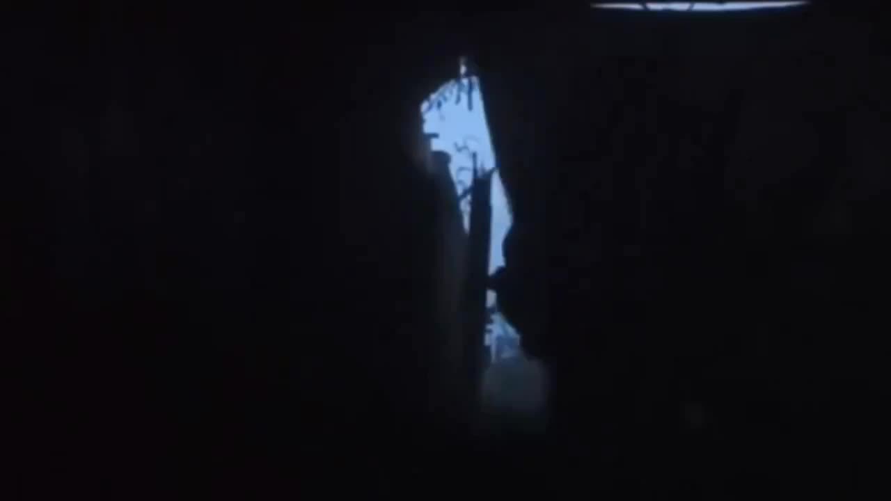 Ukrainian Soldier Firing On Russian Infantry from Outside Dugout