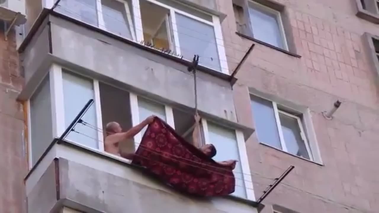 saving a cat from falling to its death