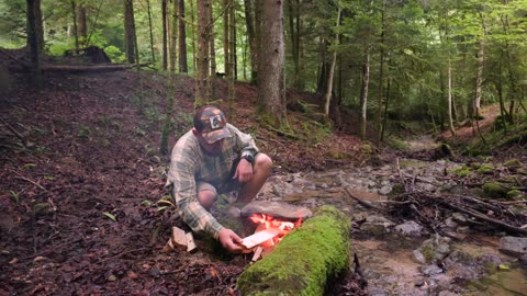 Juicy Steak Grilled on a Flat Rock by the Stream