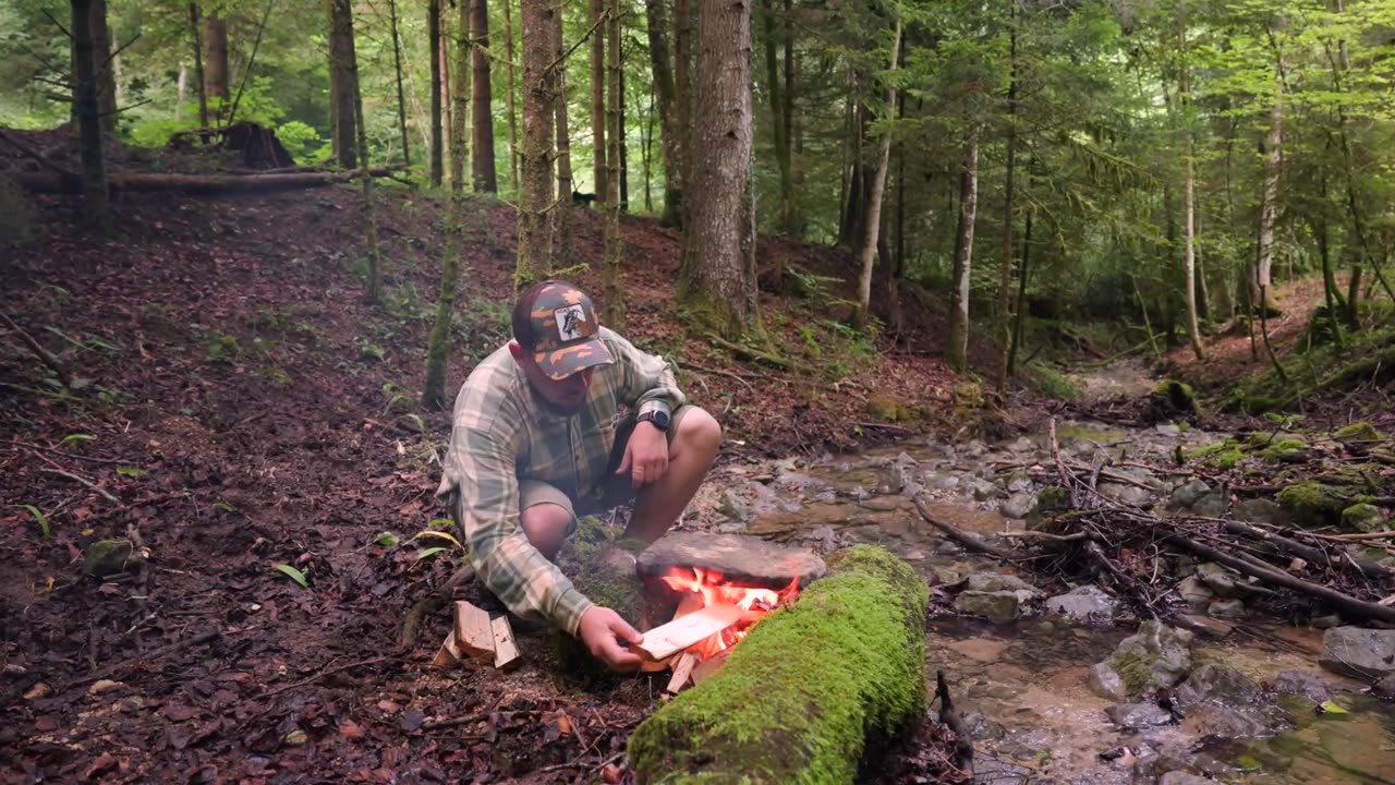 Juicy Steak Grilled on a Flat Rock by the Stream