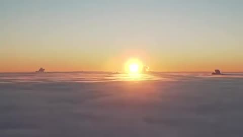 Dawn above the clouds