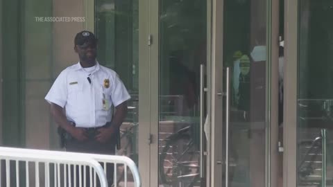 Employees of the State Department remove items after more than 1,300 were sacked.