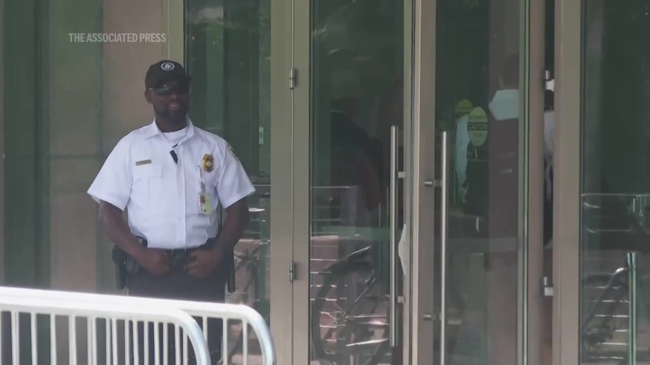 Employees of the State Department remove items after more than 1,300 were sacked.