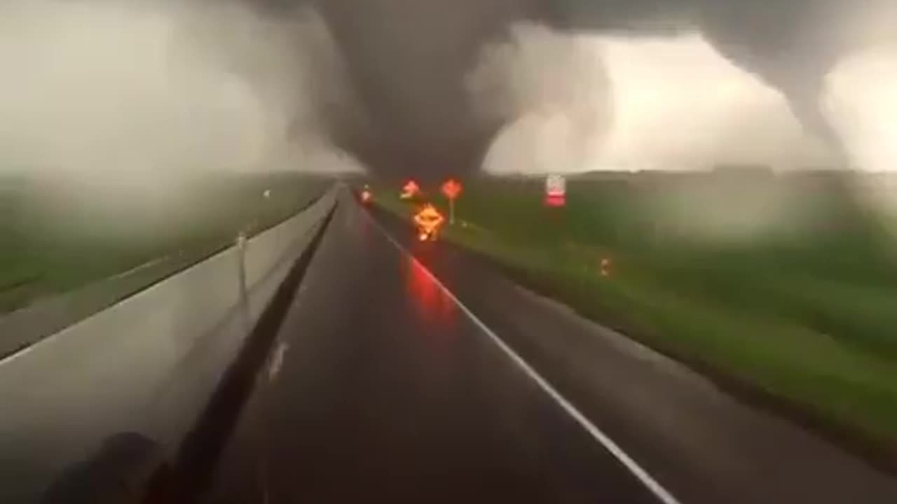 Storm chasers drive through Tornado Alley in the U.S.