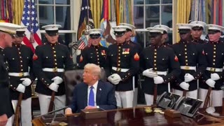 Trump personally hands each member of the Marine Corps Drill Platoon a presidential challenge coin