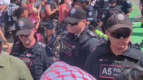 YIKES 🇨🇦 intense confrontation between Toronto Police and these protestors on Canada Day of all days