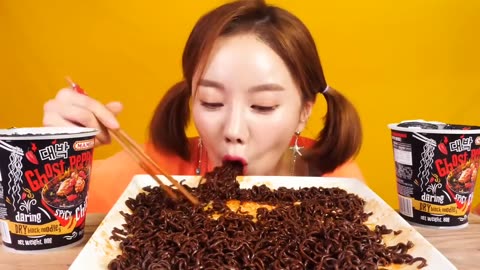 ghost pepper noodles for the first time and was so spicy that she danced with joy