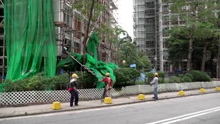 Hong Kong orders scaffolding nets removed after Wang Fuk Court fire
