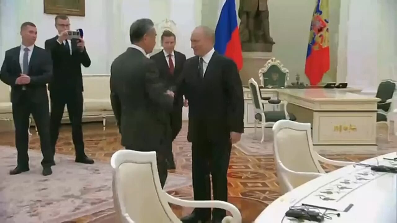 Putin meets with China's Foreign Minister Wang Yi in Russia