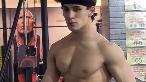 Teen Bodybuilder flexing muscles