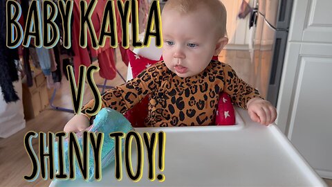 Baby Kayla Meets Shiny Fish Toy - Adorable Reaction!