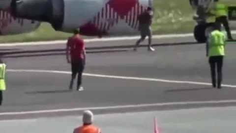 Terrifying incident as individual gets PULLED into aircraft engine