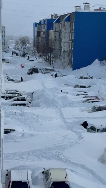 People Dig Out Their Cars After Massive Snowfall in Kamchatka, Russia