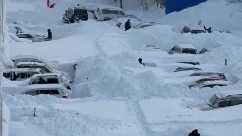 People Dig Out Their Cars After Massive Snowfall in Kamchatka, Russia