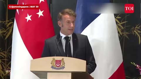 "What Is Macron Really Selling in Singapore? Peace Talk or Profits & War?"