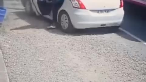 "Car Crashes Into Pole After Two Buses Overtake – Shocking Road Accident"
