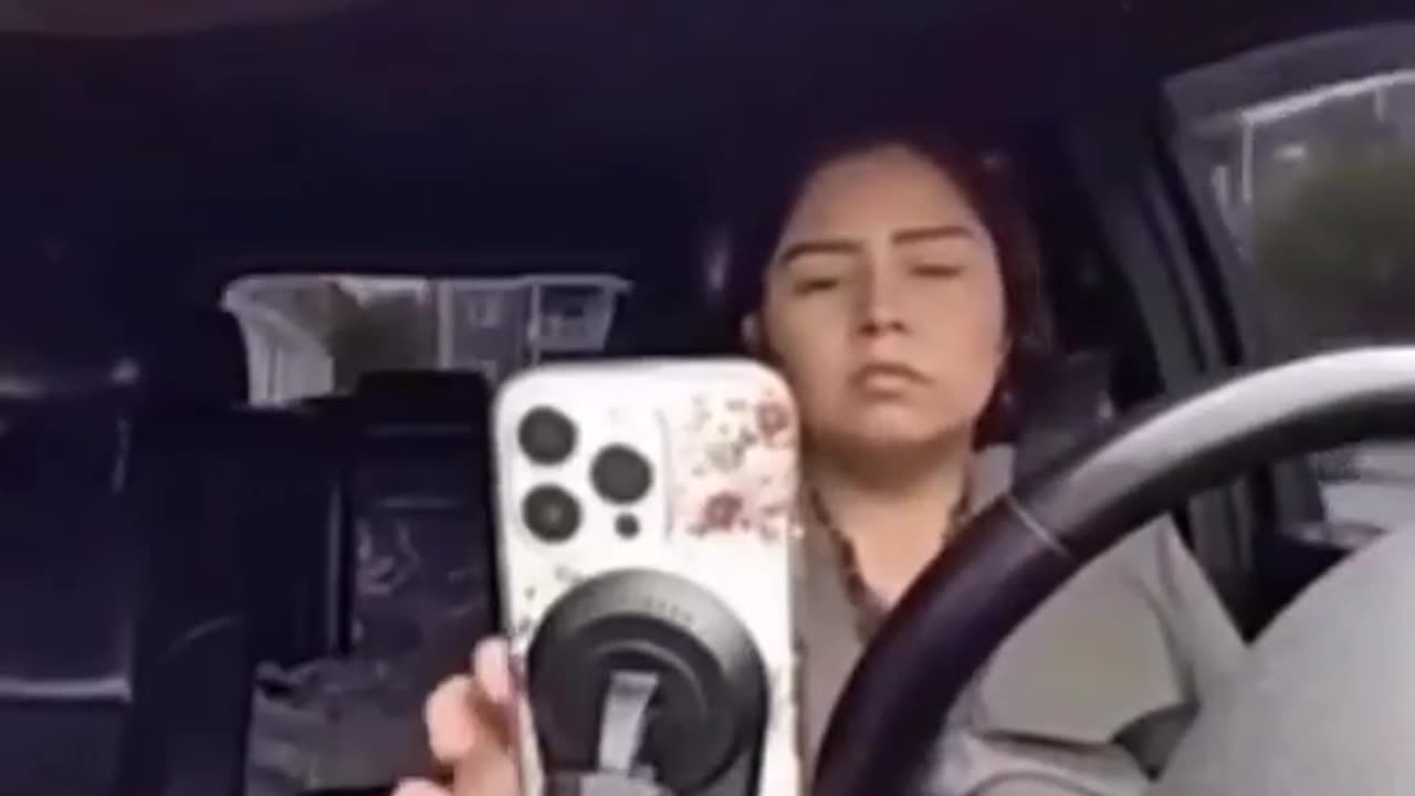 On her phone texting while driving