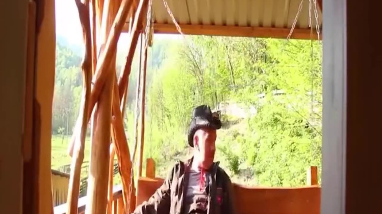 Building a house near a cliff in the forest